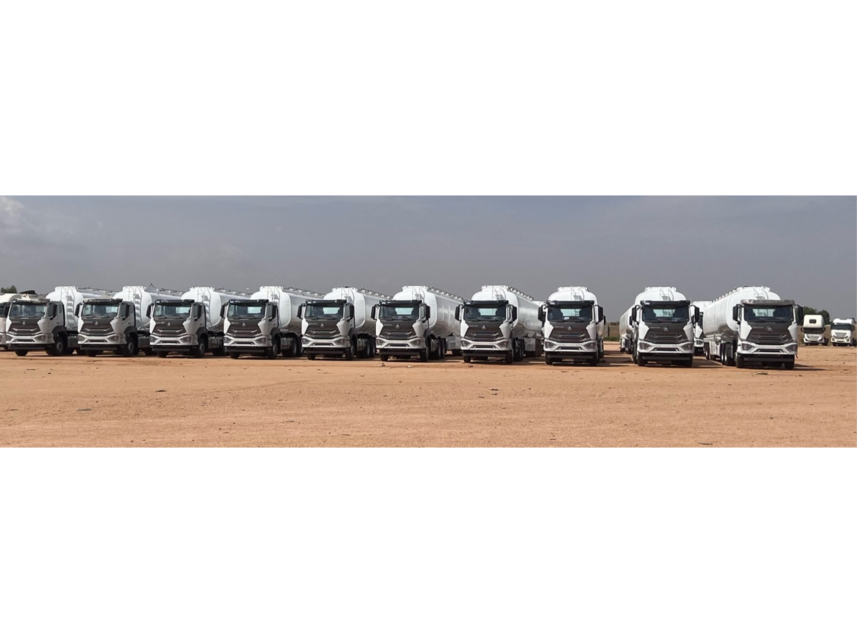 Group photo before the start of operation of HOWO E7 vehicle of Nigerian oil and gas company AY MAIKIFI